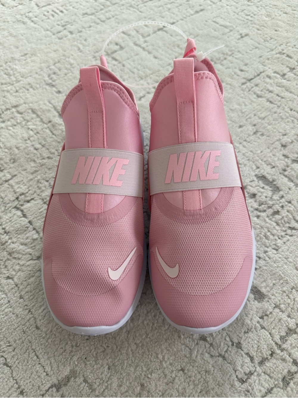 Nike Pink Slip-On Sneakers with White Swoosh